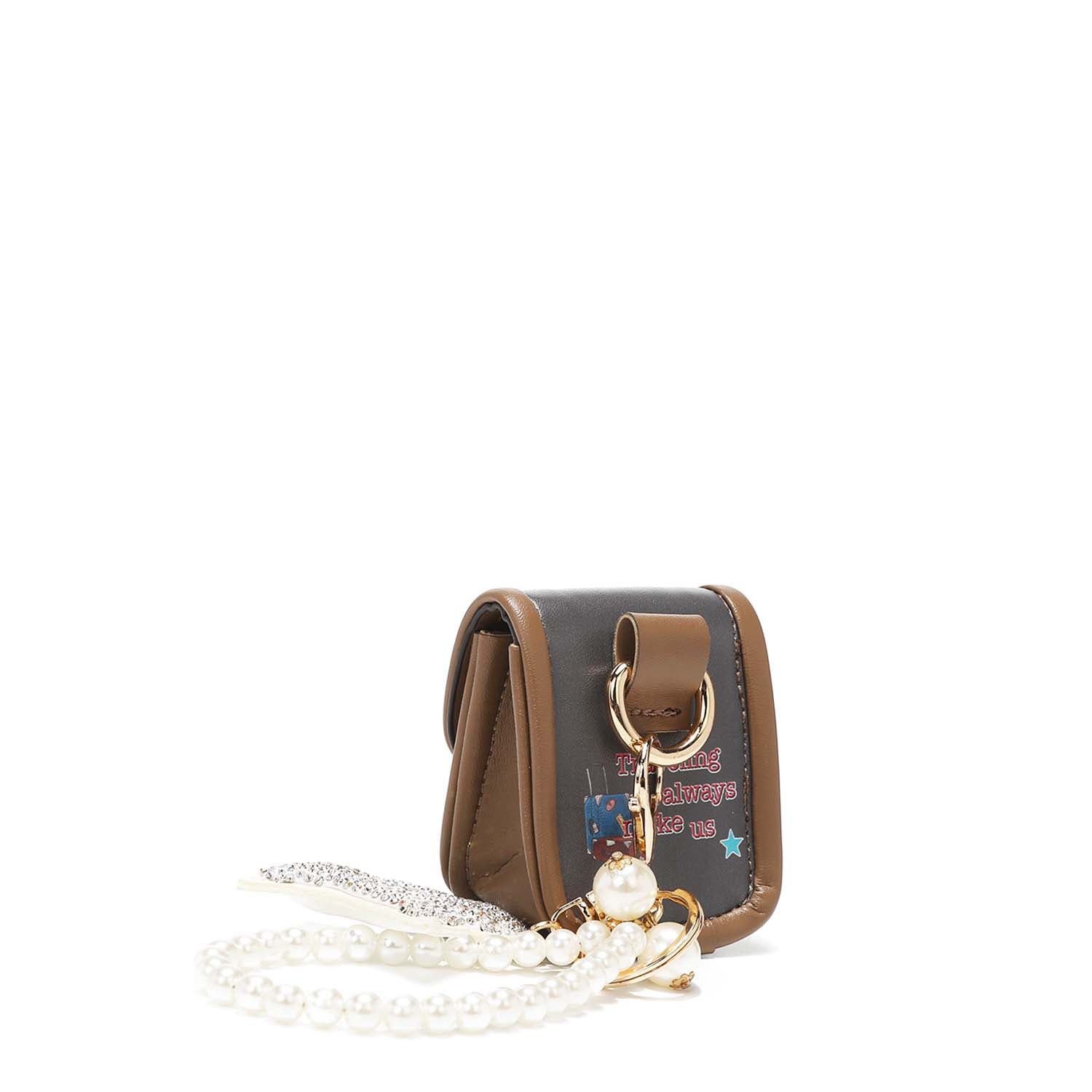 PORTE-CLÉS AVEC SUPPORT POUR CASQUE ET BRACELET EN PERLES <tc>NIKKY</tc>